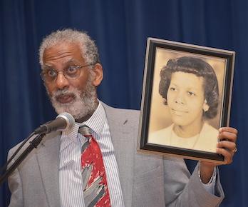 Gregory Cooke with a Photo of his Mother